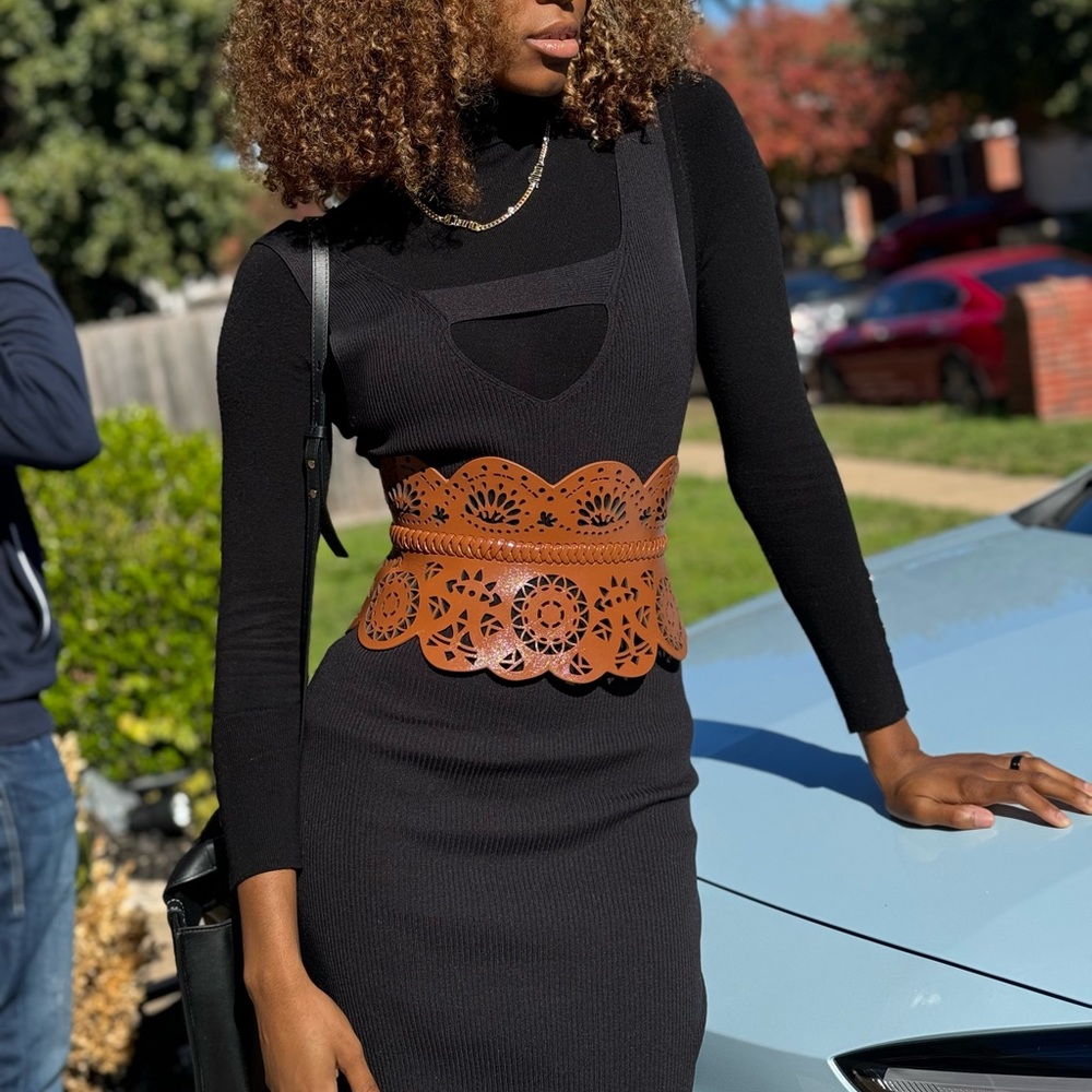 Women wide waist peplum corset statement belt. Laser cut detail.